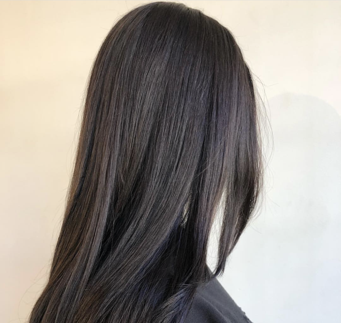 Hair by Lauren A. dark hair, brunette, sleek, smooth, silky, style, student work, natural hair, aveda, institute
