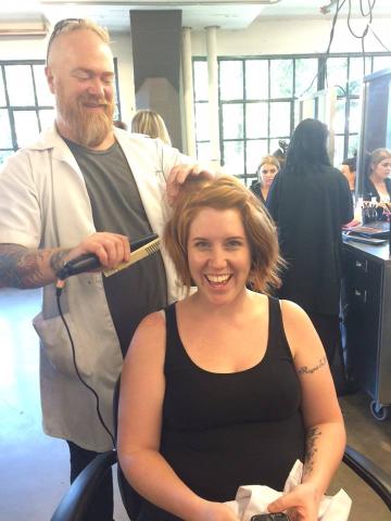 Photo of Brian and Chelsea Instructor Doing Hair